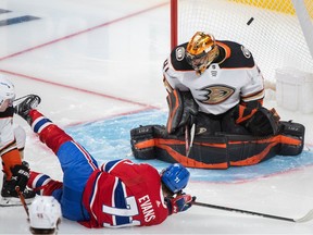 Montreal Canadiens' Jake Evans (71) scores against Anaheim Ducks goaltender Anthony Stolarz during second period NHL hockey action in Montreal, Jan. 27, 2022.