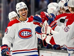 Canadiens defenceman Johnathan Kovacevic celebrates with his teammates after scoring his first NHL goal in the first period of Tuesday night’s 4-2 win over the Kraken at Seattle’s Climate Pledge Arena.