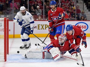 Montreal Canadiens goalie Jake Allen allows a goal by Tampa Bay Lightning forward Nicholas Paul (not pictured) as forward Alex Killorn looks on during the first period at the Bell Centre in Montreal on Dec. 17, 2022.