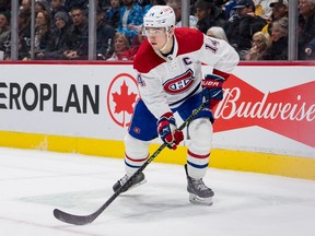 Montreal Canadiens' Nick Suzuki in action against the Vancouver Canucks during the second period at Rogers Arena in Vancouver on Dec. 5, 2022.