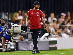D.C. United coach Hernan Losada watches the team play Inter Miami during the second half of an MLS soccer match Saturday, May 29, 2021, in Fort Lauderdale, Fla.