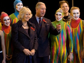 Prince Charles and Camilla with acrobats Galabina Kamenova, Elder Rodrigues de Oliveira, Michael Reavis, Dmitri Marine, Vitaly Cheremnykh during visit at the Cirque du Soleil in Montreal on Nov. 10, 2009.