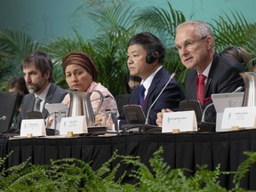 Csaba Korosi, right, 77th president of the UN General Assembly, speaks at the opening of the high-level segment at the COP15 biodiversity conference as Canada's Environment Minister, Steven Guilbeault, left, Amina Mohammed, Deputy Secretary-General of the United Nations, and Chair Huang Runqiu, Chinese Minister of Ecology and Environment, look on in Montreal, Thursday, Dec. 15, 2022.