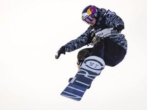 Quebecer Sébastien Toutant competes during the men's World Cup slopestyle snowboard final in Calgary on Jan. 1, 2022.
