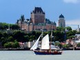 Quebec City's iconic Fairmont Le Château Frontenac dominates the city skyline from the ferry crossing the St. Lawrence River, Aug. 15, 2015.