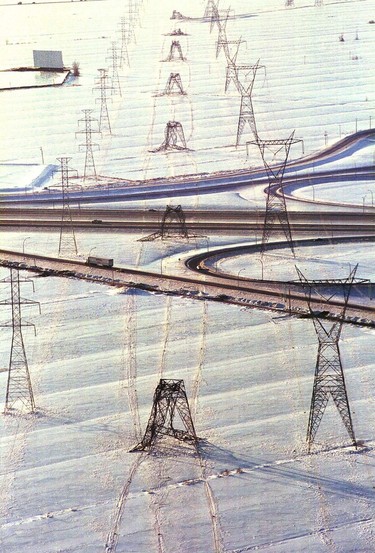Hydro towers look like fallen dominoes in Boucherville on Jan. 14, 1998.