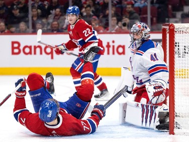 New York Rangers goaltender Jaroslav Halak (41) looks past Montreal Canadiens centre Kirby Dach (77) after Dach was upended in the gold crease during NHL action in Montreal, on Thursday, Jan. 5, 2023.
