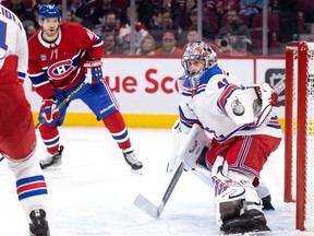 Montreal Canadiens right wing Joel Armia (40) looks on as New York Rangers goaltender Jaroslav Halak (41) reaches for a wide shot on net on Jan. 5, 2023.