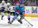 Montreal Canadiens' Juraj Slafkovsky skates sway from Seattle Kraken's Ryan Donato during third period in Montreal on Jan. 9, 2023.