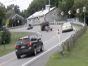 An image taken from a video that captured the moment before Félix-Antoine Gagné's motorcycle collided with Éric Rondeau's pickup truck on Route 345 in Ste-Élisabeth on July 22, 2019.