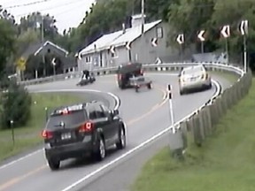 An image taken from a video that captured the moment before Félix-Antoine Gagné's motorcycle collided with Éric Rondeau's pickup truck on Route 345 in Ste-Élisabeth on July 22, 2019.