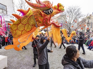 A dragon dance is performed in Sun Yat-Sen Park in Montreal's Chinatown during Lunar New Year festivities on Saturday, Jan. 21, 2023.
