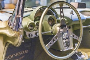 The dashboard, steering wheel and instrument cluster of the 1958 Fancy Free Corvette.