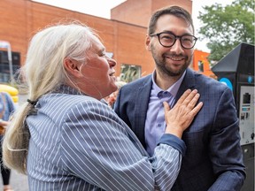 Québec solidaire co-spokesperson Manon Massé greets Guillaume Cliche-Rivard, the party’s candidate in the Saint-Henri—Sainte-Anne riding.