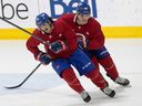 Winger Ryan Francis, left, with Juraj Slafkovsky during day one of Montreal Canadiens training camp in Brossard on September 22, 2022.
