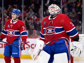 Canadiens goaltender Jake Allen (34) looks to the rafters after allowing the New York Rangers to score during NHL action in Montreal, on Thursday, January 5, 2023. Montreal Canadiens centre Jake Evans (71) is also seen.