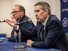 Montreal Alouettes general manager Danny Maciocia, left, and team president Mario Cecchini hold a season-ending news conference in Montreal on Nov. 22, 2022.