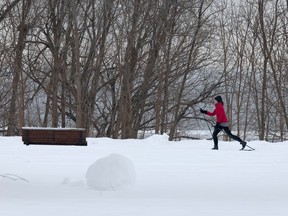 A skier takes advantage of an almost-empty Monseigneur J-A Richard Park in Montreal.
