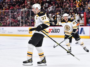 Patrice Bergeron of the Boston Bruins celebrates his goal during the third period against the Montreal Canadiens at the Bell Centre in Montreal on Jan. 24, 2023.