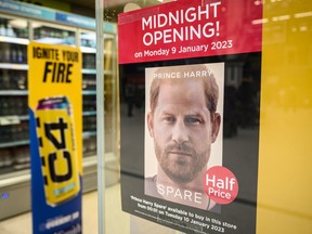 A poster advertising the launch of Prince Harry's memoir Spare is seen in a store window on Jan. 6, 2023, in London, England. The book is scheduled to officially go on sale on Tuesday, Jan. 10, but journalists have already obtained leaked excerpts or copies that accidentally went on sale early in Spain.
