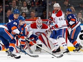 Canadiens' Sam Montembeault defends the net against the New York Islanders during the first period at the UBS Arena on Saturday, Jan. 14, 2023, in Elmont, N.Y.