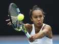 Leylah Fernandez of Canada plays a backhand in their round two singles match against Caroline Garcia of France during day four of the 2023 Australian Open at Melbourne Park on January 19, 2023 in Melbourne, Australia.