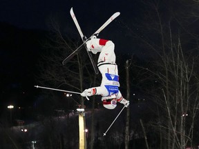 Mikael Kingsbury of Ste-Agathe-des-Monts skis in the preliminary round of the men's dual moguls freestyle ski world cup at Val St-Come on Saturday, Jan. 28, 2023.
