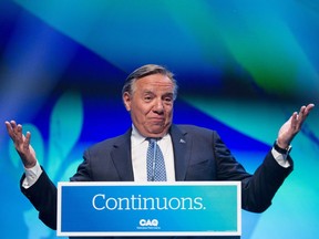 CAQ leader François Legault celebrates his reelection as premier at the Capitole theater in Quebec City on Oct. 3, 2022