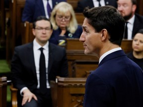 Prime Minister Justin Trudeau, watched by Conservative Party of Canada leader Pierre Poilievre, speaks in the House of Commons in September. Poilievre has failed to defend a fundamental characteristic of this country, Robert Libman writes.