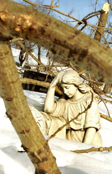 "Seemingly resigned to a long wait for cleanup crews or a spring thaw, a stone angel in Notre-Dame-des-Neiges Cemetery on Mount Royal ponders the aftermath of the ice storm," notes photographer Gordon Beck on Feb. 4, 1998.