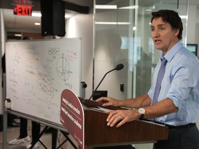 Prime Minister Justin Trudeau addresses media after touring Xanadu Quantum Technologies in Toronto, Monday, Jan. 23, 2023.