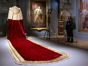 The outfit worn by England's King George III (1738-1820) during his coronation is displayed with his portrait at a 2009 exhibition in Versailles.