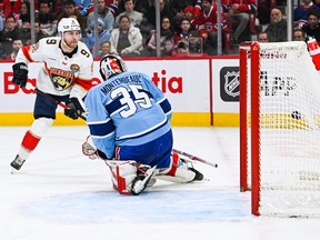 Florida Panthers centre Sam Bennett (9) scores a goal against Montreal Canadiens goalie Sam Montembeault (35) during the second period at Bell Centre in Montreal on Jan. 19, 2023.