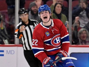 Canadiens forward Cole Caufield (22) celebrates after scoring a goal against the St. Louis Blues during the third period at the Bell Centre on Jan. 7, 2023.