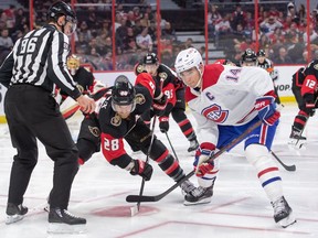 Ottawa Senators right wing Claude Giroux (28) faces off against Montreal Canadiens centre Nick Suzuki (14) in the second period at Ottawa's Canadian Tire Centre on Saturday, January 28, 2023.