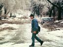 A man walks across Hingston Ave. in N.D.G. on January 6, 1998 amid the effects of the ice storm.