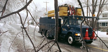 Hydro-Québec crews prowl the streets of Pointe-Claire on Jan. 6, 1998.
