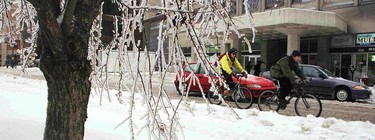 Bike couriers go about their business in downtown Montreal on Jan. 9, 1998.
