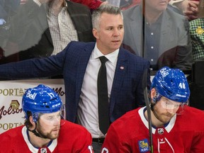 Canadiens head coach Martin St. Louis behind the bench during the National Hockey League game against the Nashville Predators in Montreal on Thursday, Jan. 12, 2023.