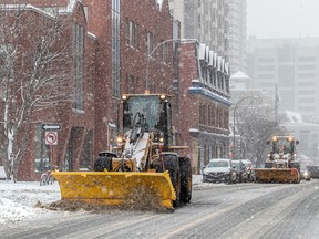 City workers clear the streets of Westmount on Friday Jan. 13, 2023.