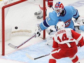 Detroit Red Wings' Robby Fabbri scores winning goal on Montreal Canadiens' Jake Allen during overtime in Montreal on Jan. 26, 2023.