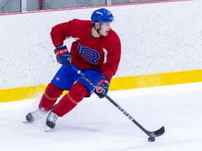 Anthony Richard stickhandles during a Laval Rocket practice at Place Bell on Tuesday January 31, 2023.