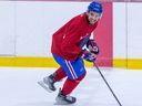 Peter Abbandonato laughs as he skates through a drill during Laval Rocket practice at the Place Bell Sports Complex in Laval on Jan. 31, 2023.