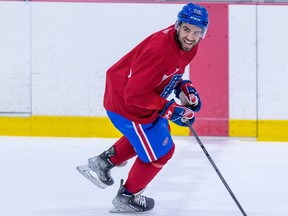 Peter Abbandonato laughs as he skates through a drill during Laval Rocket practice at the Place Bell Sports Complex in Laval January 31, 2023.