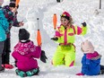 Winter wellness coach and juggler Marianne Trenks, aka Cassandra, teaches kids how to juggle during the Kirkland Winter Carnival held recently at Meades Park.