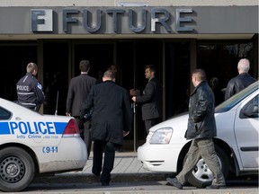 Montreal Police Investigators enter Future Electronics in Pointe-Claire on November 4, 2009.