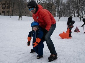 Two-year-old Clementine Starck and dad David Starck skate at Lafontaine Park Feb. 5, 2023.