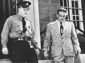 Wilbert Coffin leaves Quebec Jail handcuffed to a police officer in September 1955 for the trip to Bordeaux Jail in Montreal, where he was later hanged for a murder many believe he did not commit.