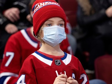 Young hockey fans enjoy a matinee game during NHL play between the Canadiens and the Edmonton Oilers in Montreal on Sunday, Feb. 12, 2023.