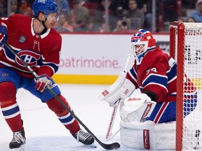 Montreal Canadiens defenceman Mike Matheson and Montreal Canadiens goaltender Jake Allen during second period action against the Edmonton Oilers in Montreal on Feb. 12, 2023.